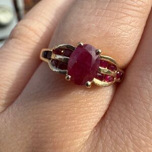 10k Gold Ring with Oval Red Ruby Center and Accent Stones